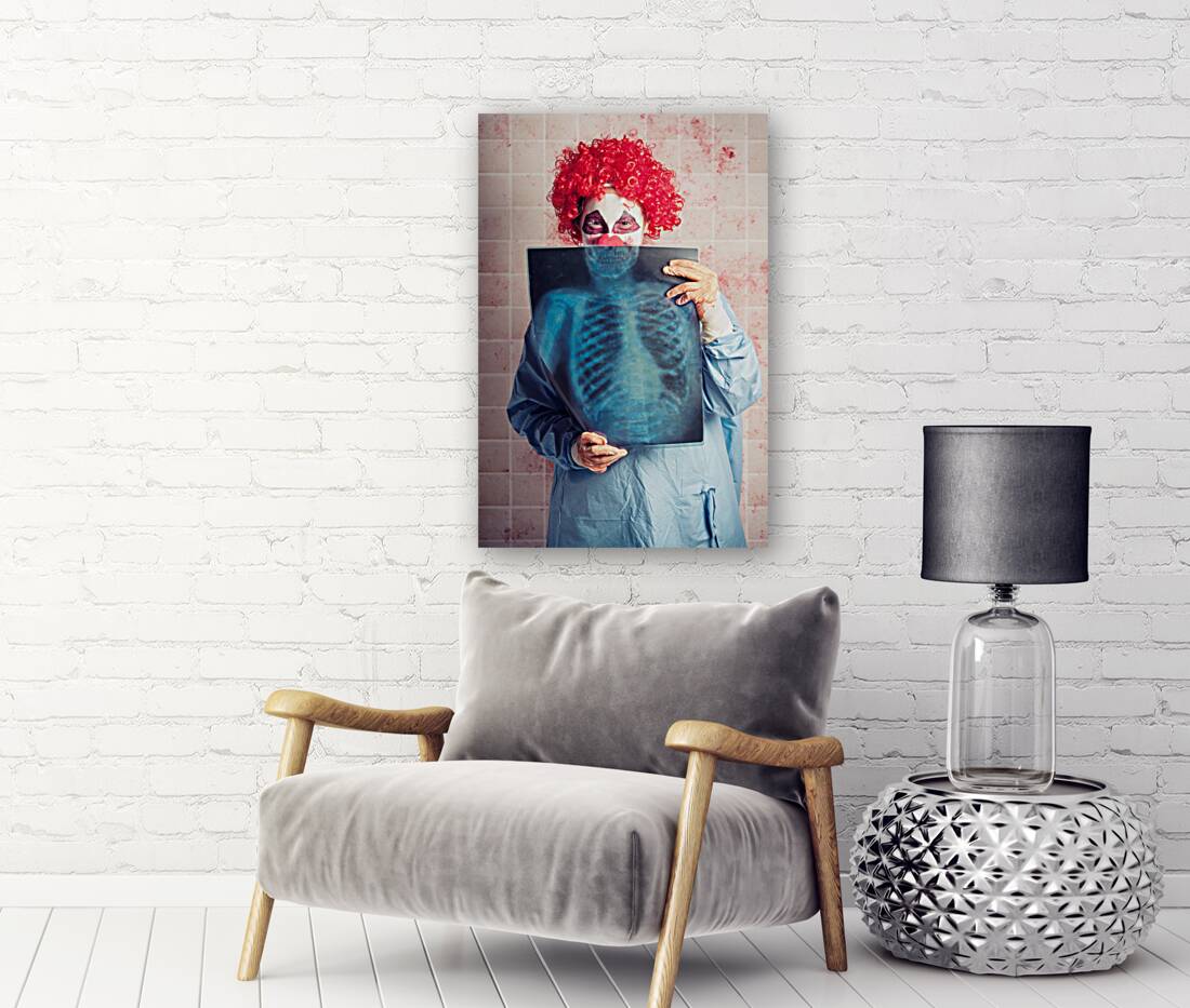 Scary clown peeking behind x-ray. Funny bones Reproduction