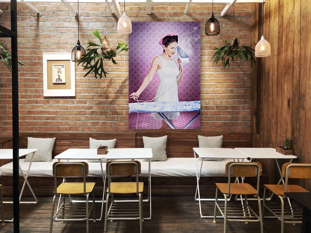 Ironing pinup housewife doing sixties housework Reproduction