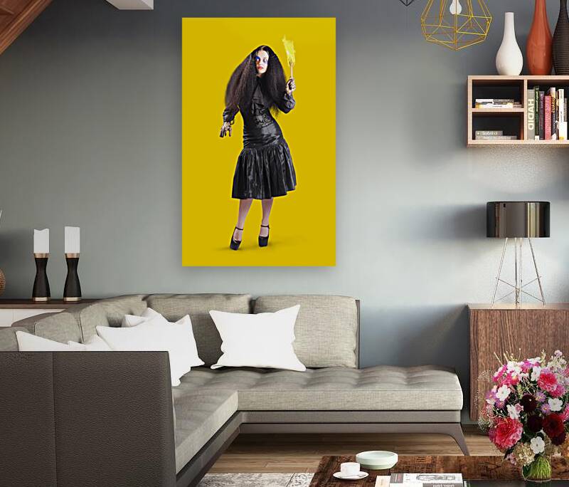 Female jester holding lit fire torch Reproduction