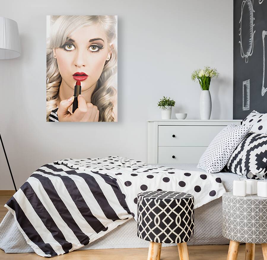 Sexy retro pinup girl applying makeup on lips Reproduction