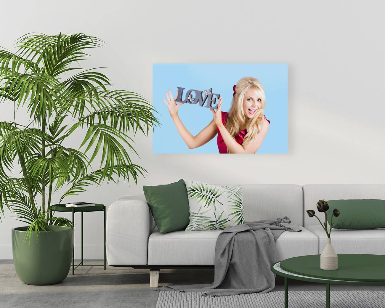 Fun blonde woman with love word sign Reproduction