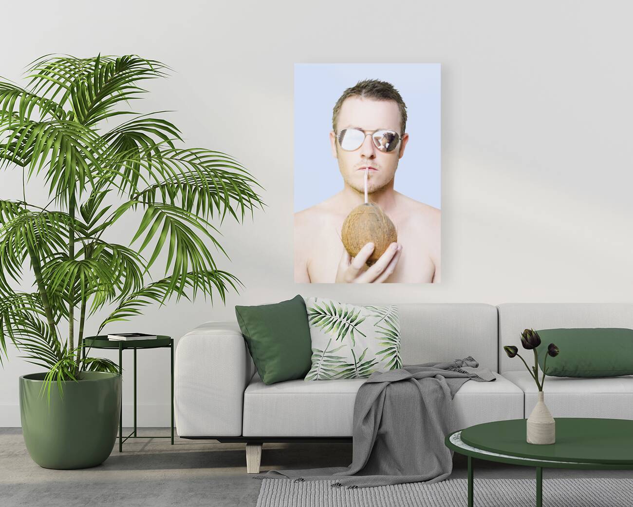 Handsome summer man drinking coconut cocktail Reproduction