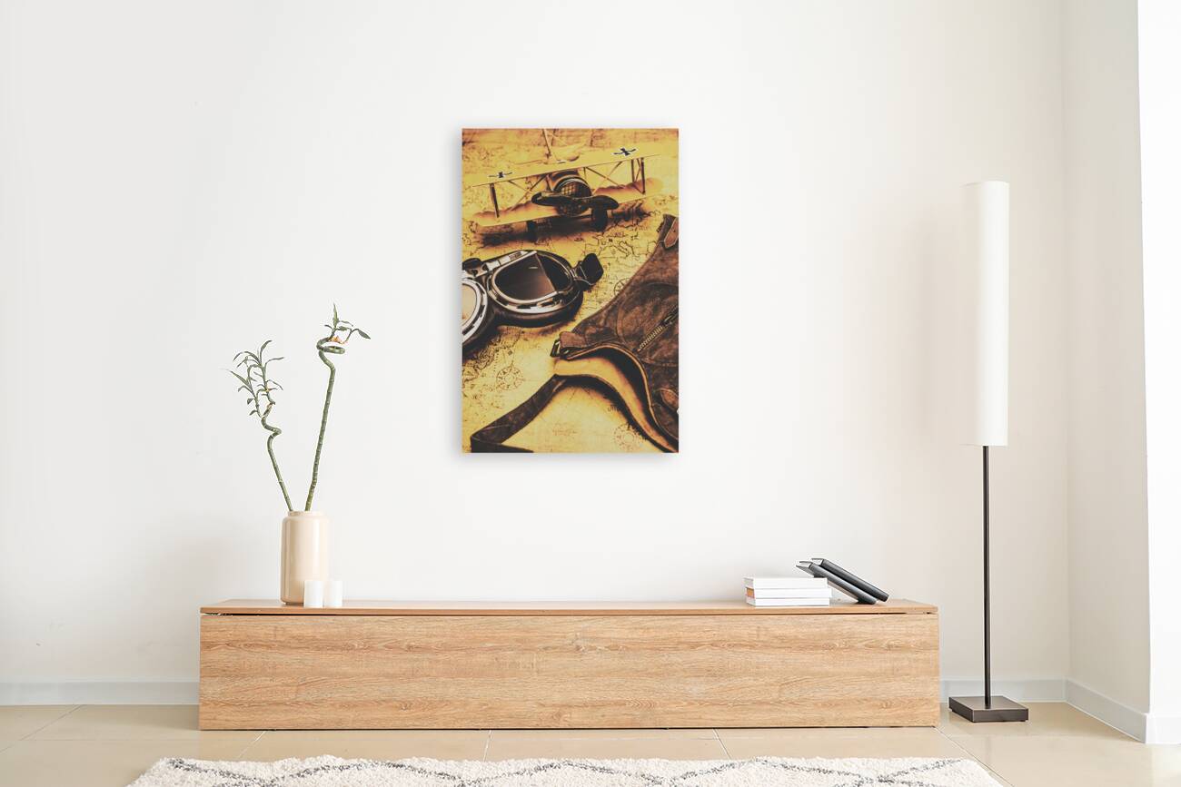 Aviator goggles cap and airplane on old world map Reproduction