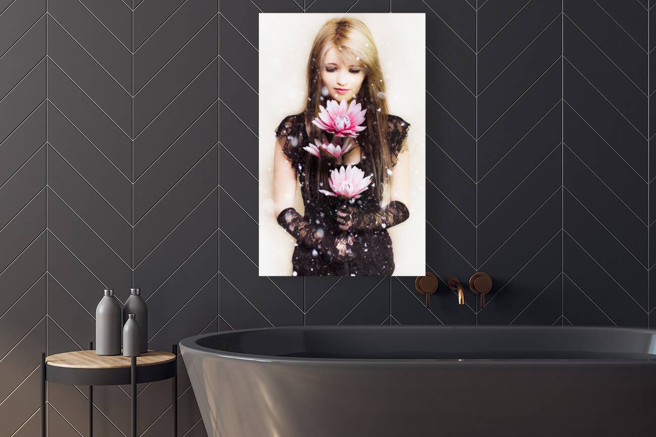 Beautiful young woman holding a delicate flower Reproduction