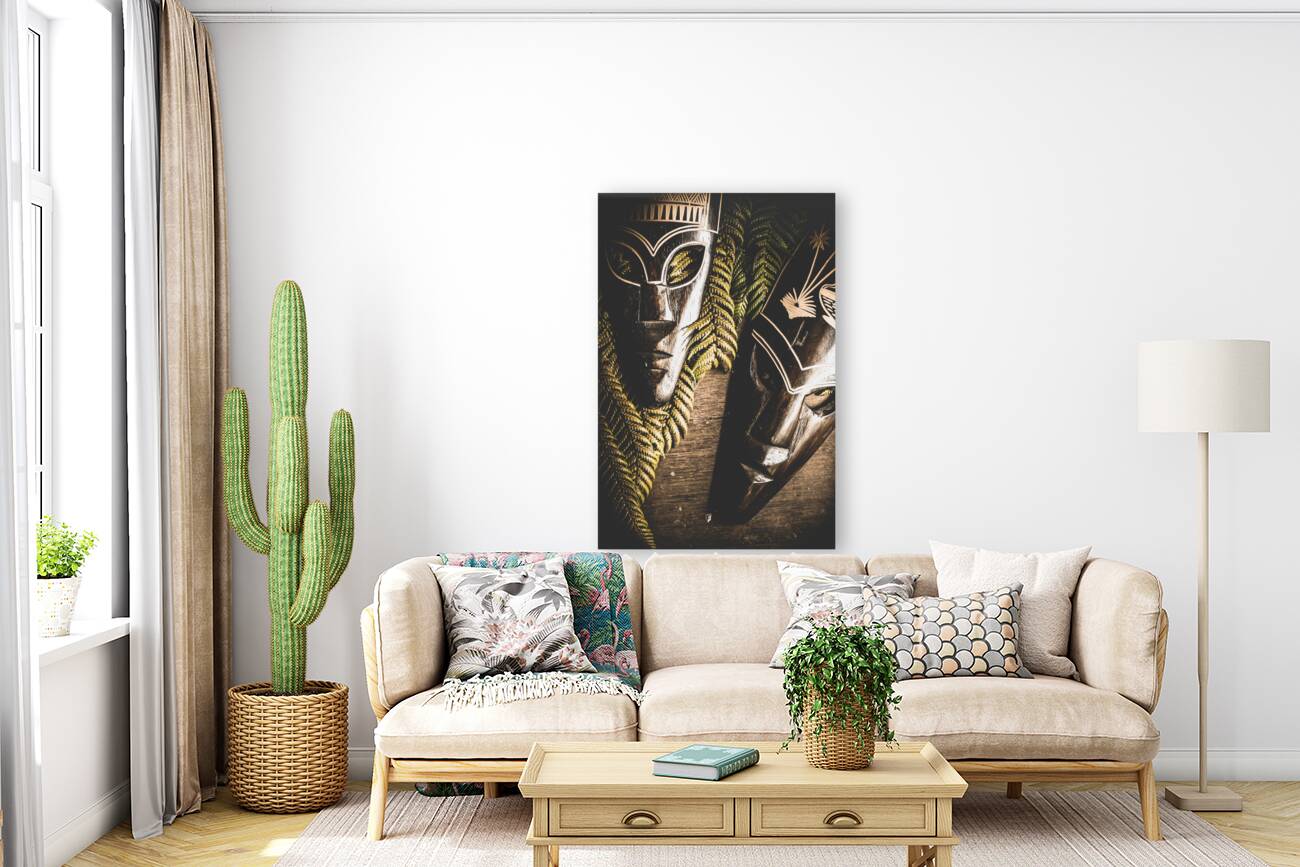 Tribal Masks With Ferns On Wooden Table Reproduction