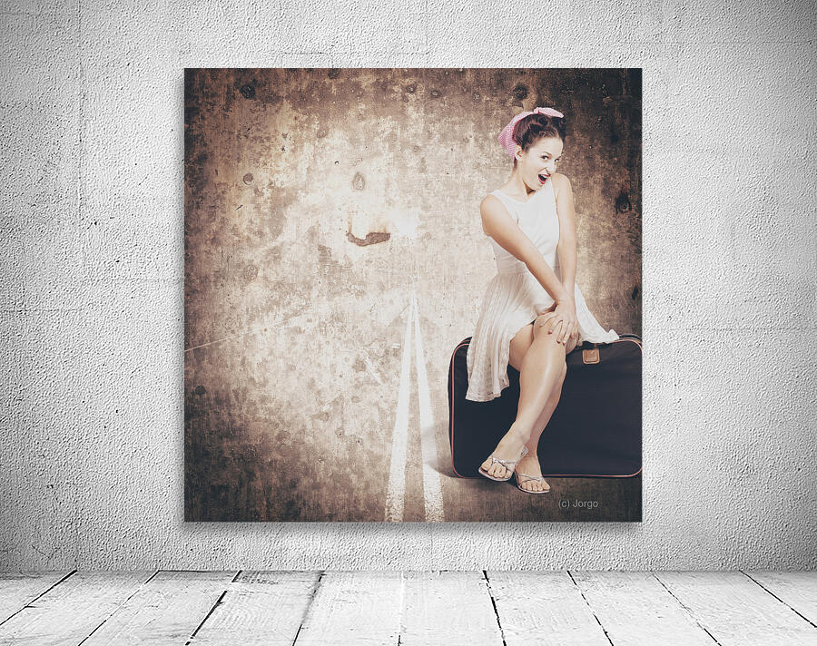 Young hitchhiking pin-up woman on vintage suitcase Wall Preview