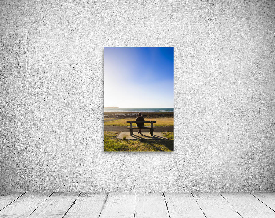 Male tourist enjoying ocean landscape sunset Wall Preview