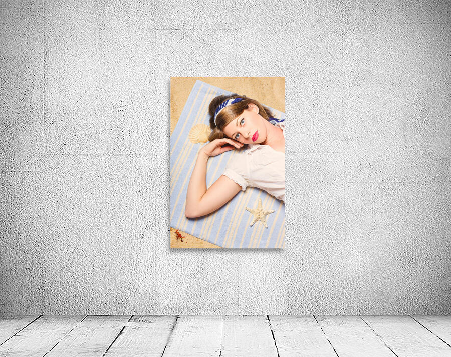Hot retro pinup girl lying on beach in Australia Wall Preview