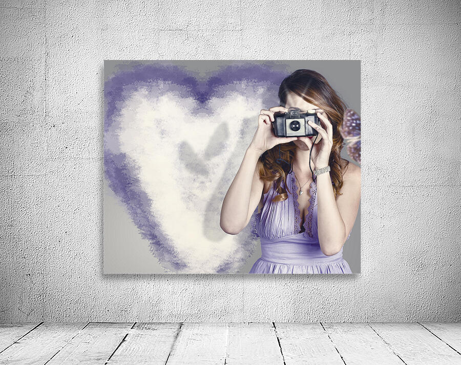 Woman with camera. Love in a still frame capture Wall Preview