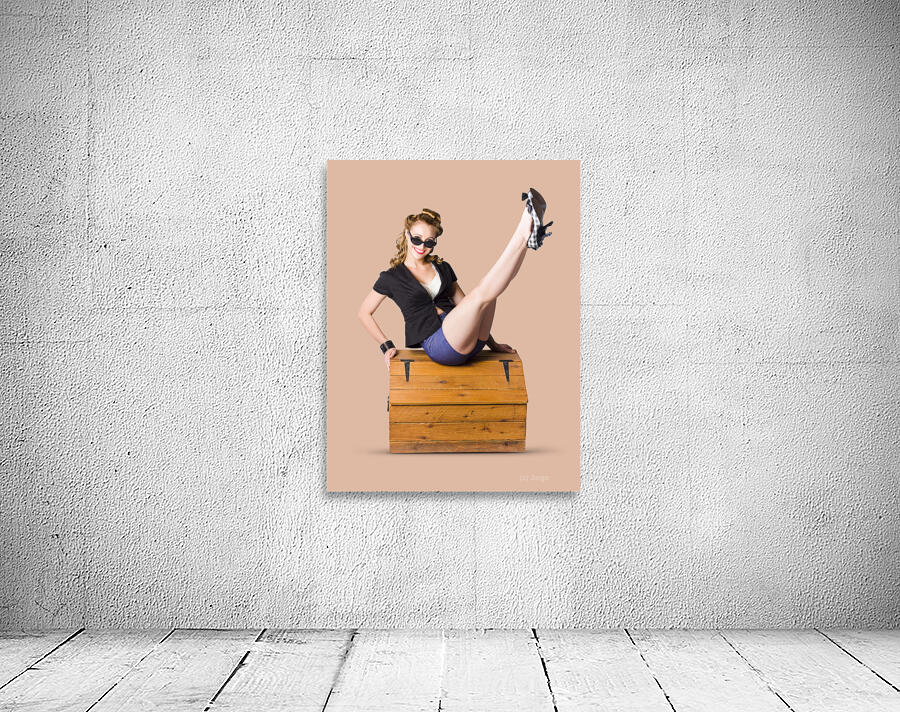 Pin-up seated on a pine trunk Wall Preview