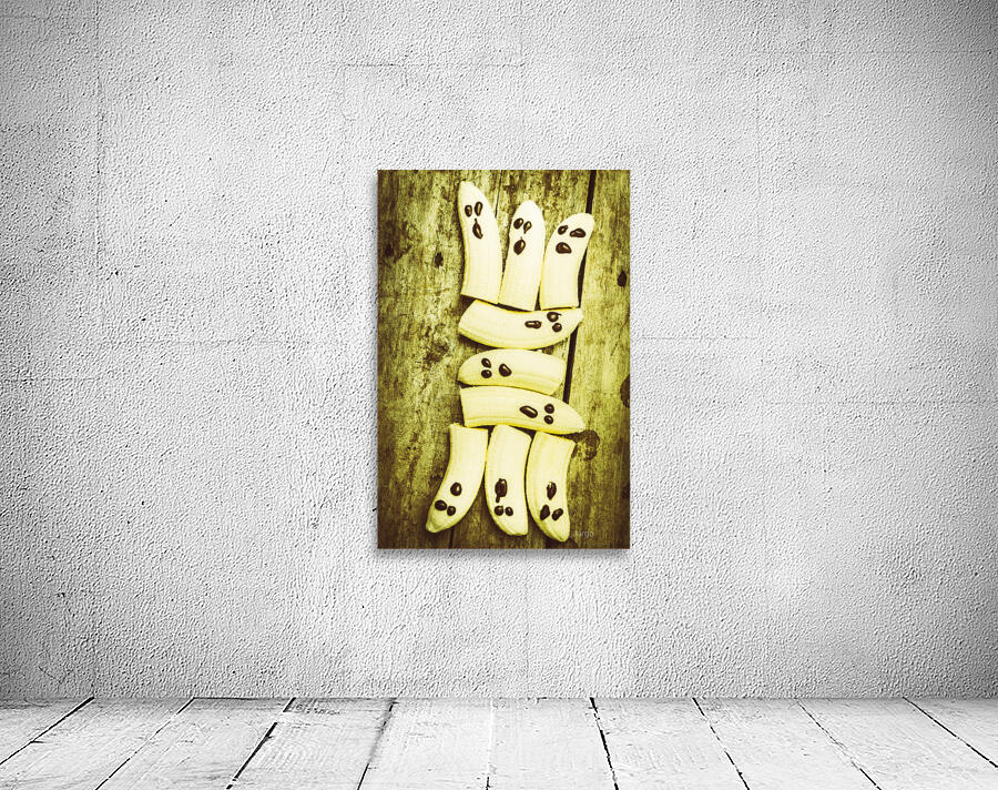 Bananas with painted chocolate faces Wall Preview