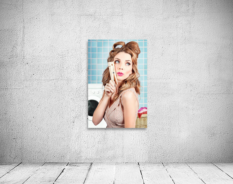 Gorgeous pin-up woman holding large cleaning peg Wall Preview
