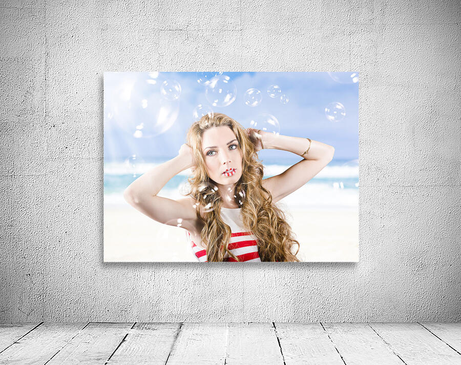 Beautiful girl wearing summer make-up on beach Wall Preview