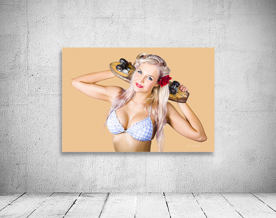 Woman holding skateboard Wall Preview