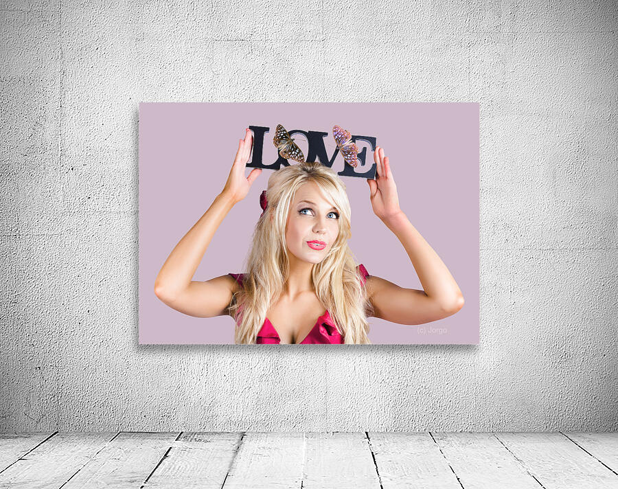 Woman holding love sign Wall Preview