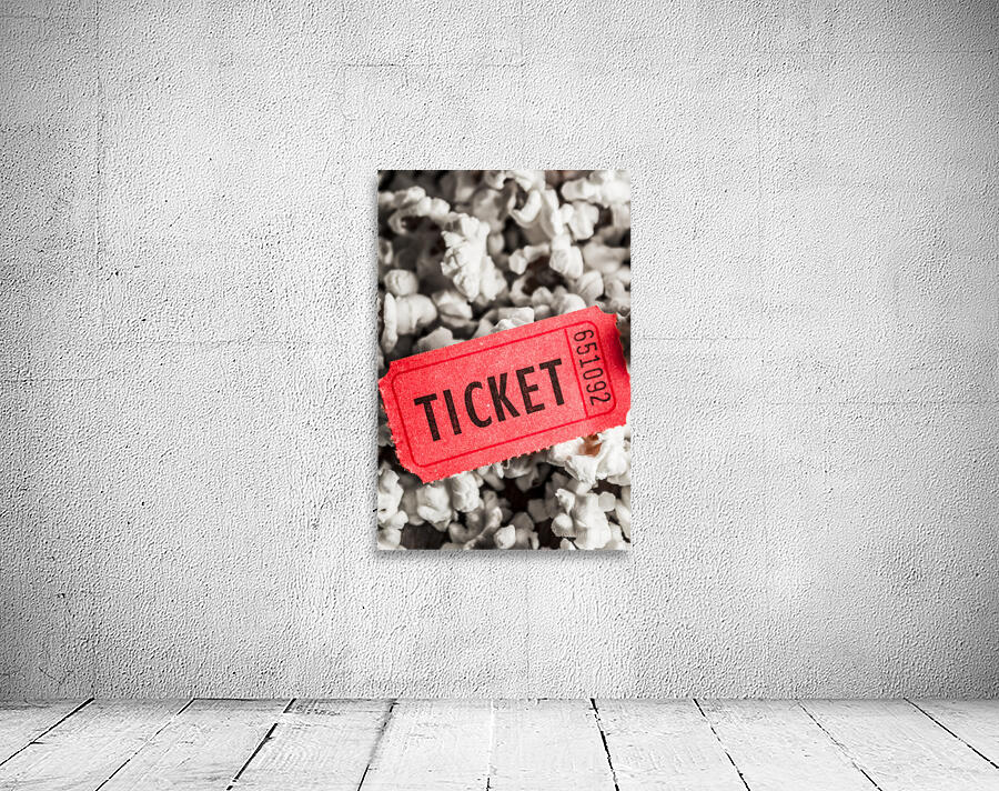 Event ticket lying on pile of popcorn Wall Preview