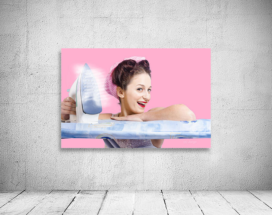 Smiling housewife doing housework laundry duties Wall Preview
