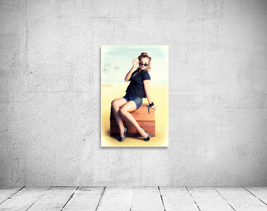 Travelling Pin-Up Girl Sitting On Vintage Luggage Wall Preview
