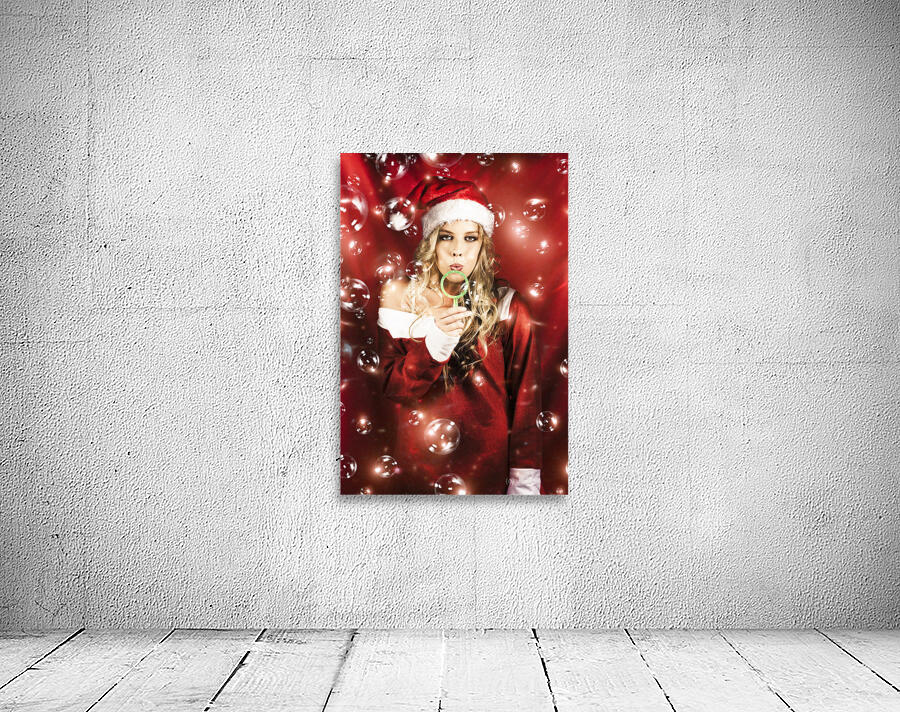 Attractive Christmas Woman Blowing Magic Bubbles Wall Preview