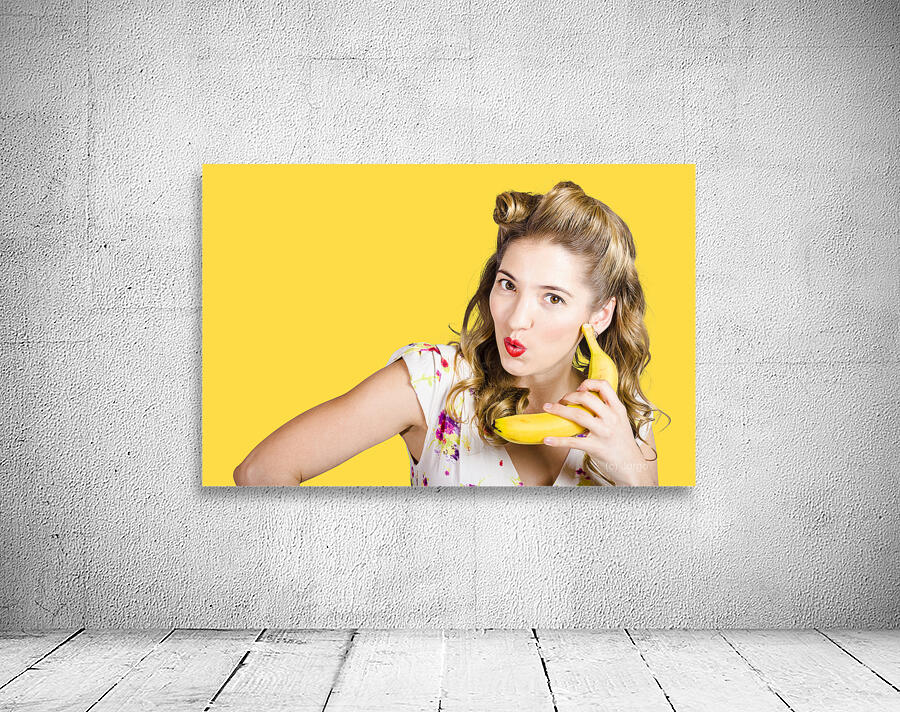 Pinup woman ordering organic fruit on banana phone Wall Preview