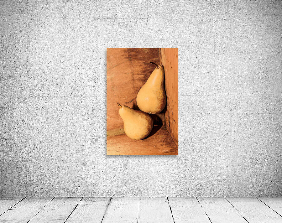 Yellow colored pears on wooden background Wall Preview