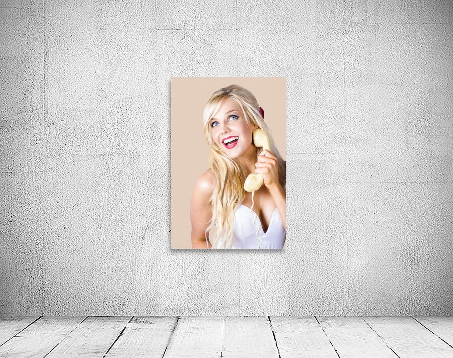 Gorgeous blond woman laughing on telephone call Wall Preview