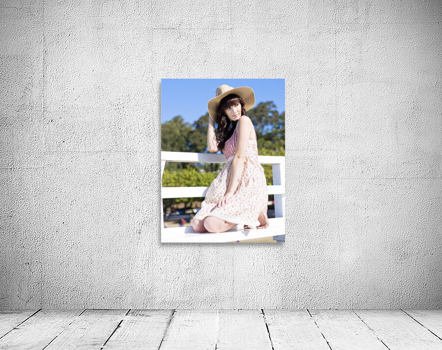 Portrait Of A Smiling Woman Resting On A Pier Bench Wall Preview