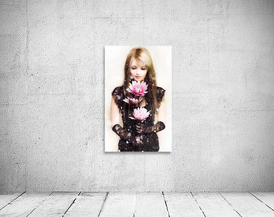 Beautiful young woman holding a delicate flower Wall Preview