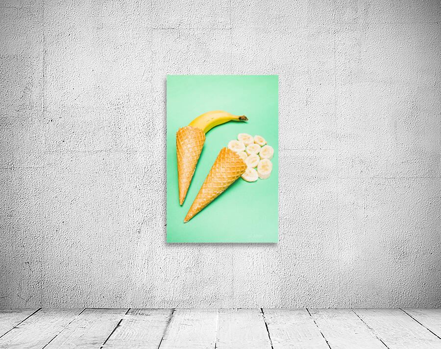 Whole bannana and slices placed in ice cream cone Wall Preview