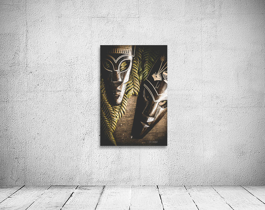 Tribal Masks With Ferns On Wooden Table Wall Preview