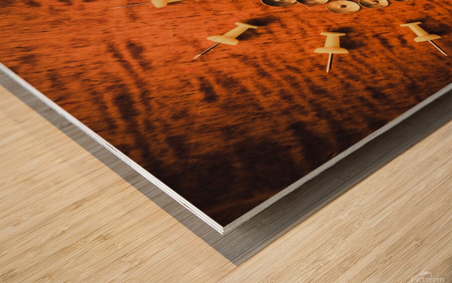 Pushpins arranged in light bulb icon Wood print