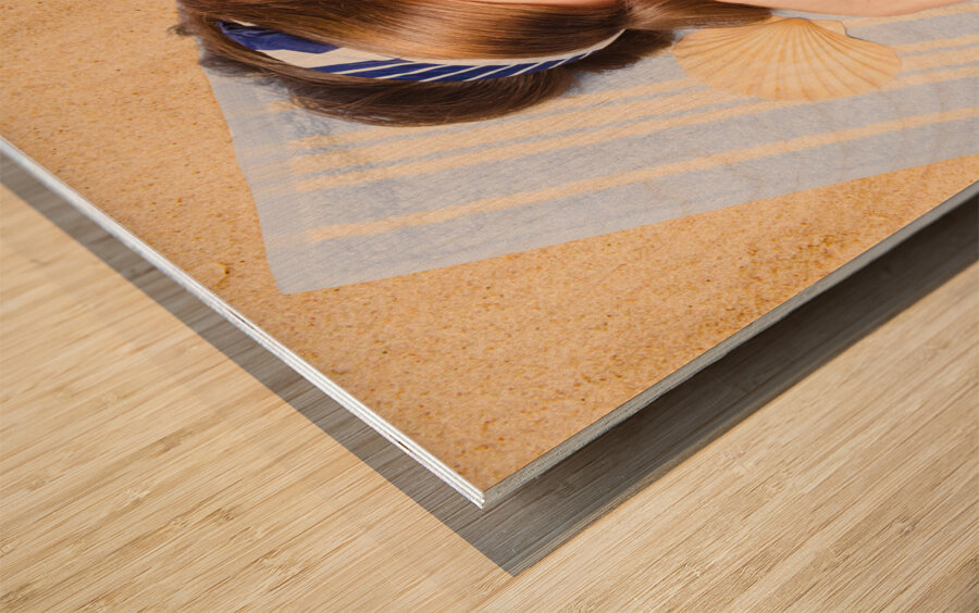 Hot retro pinup girl lying on beach in Australia Wood print