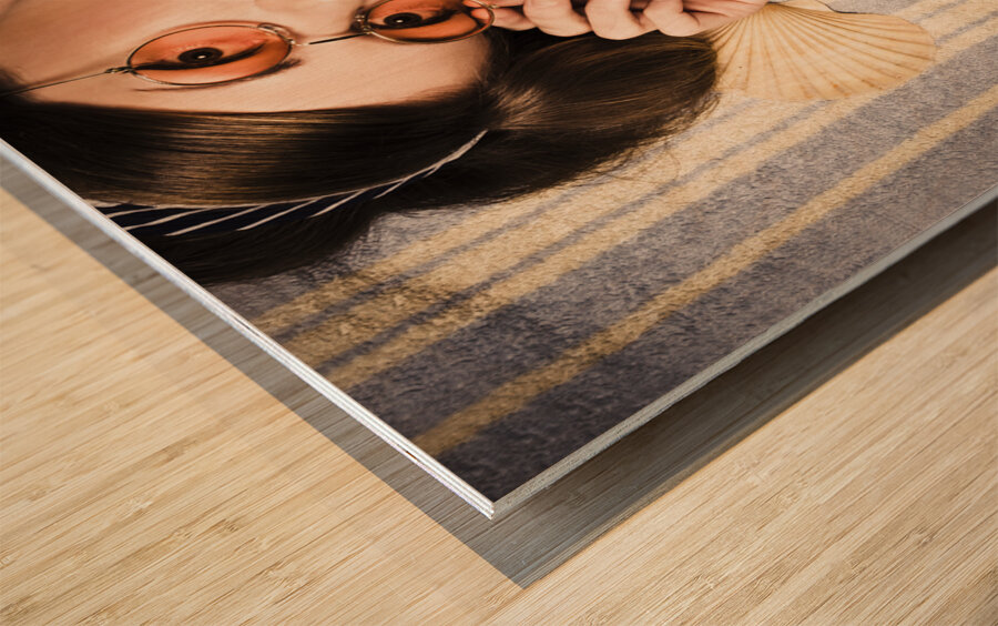 Eyewear fashion model. Pin up woman in sun shades Wood print