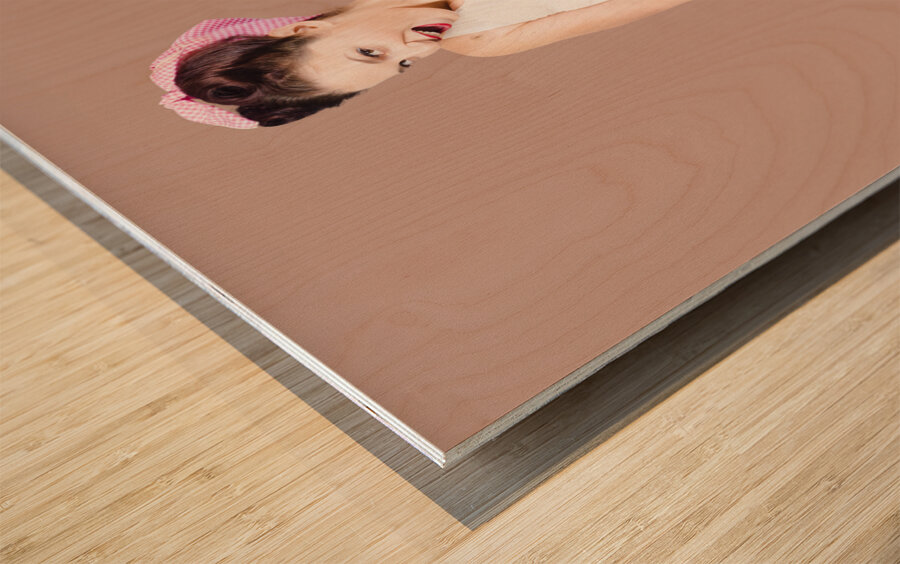 Female pinup travelling tourist sitting on luggage Wood print