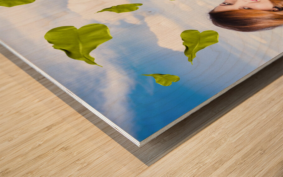 Elegant young woman with shears. Gardening love Wood print