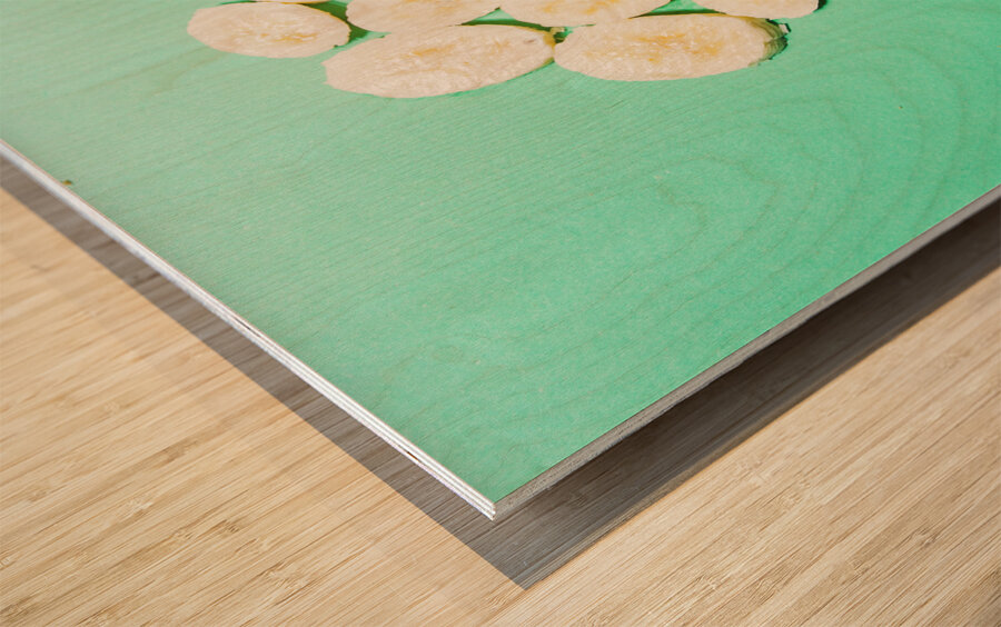 Waffle cones with fresh banana Wood print