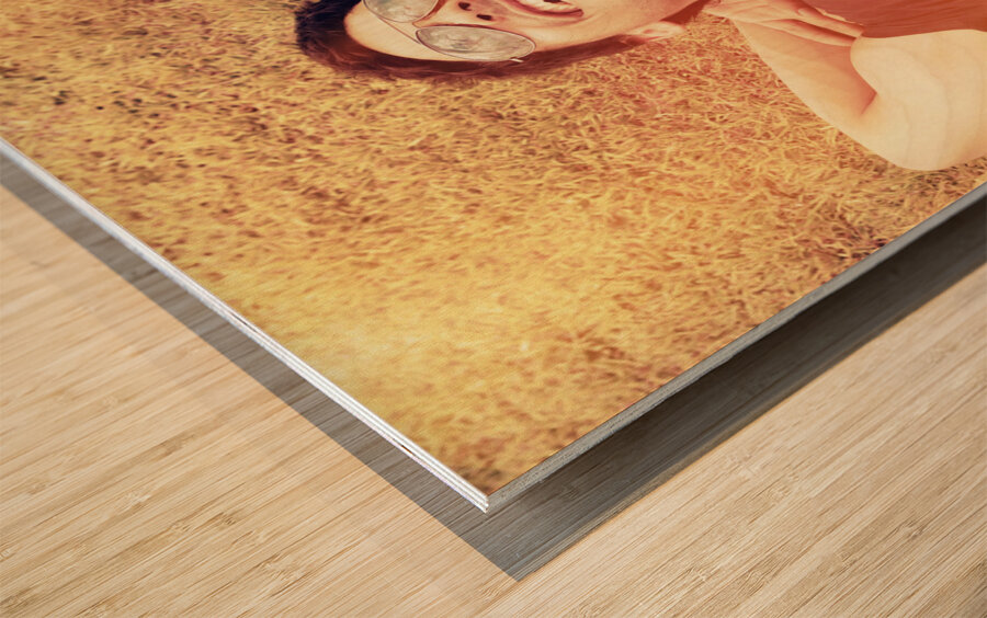 Happy man laughing while enjoying summer holidays Wood print