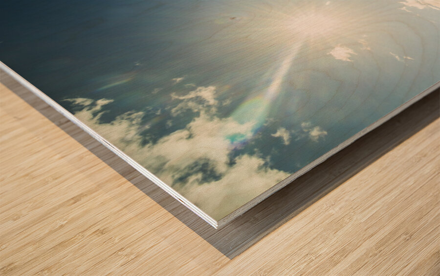 Beautiful coast with distant mountains Wood print