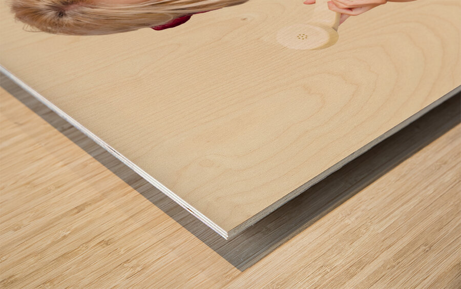 Confused woman with retro phone Wood print