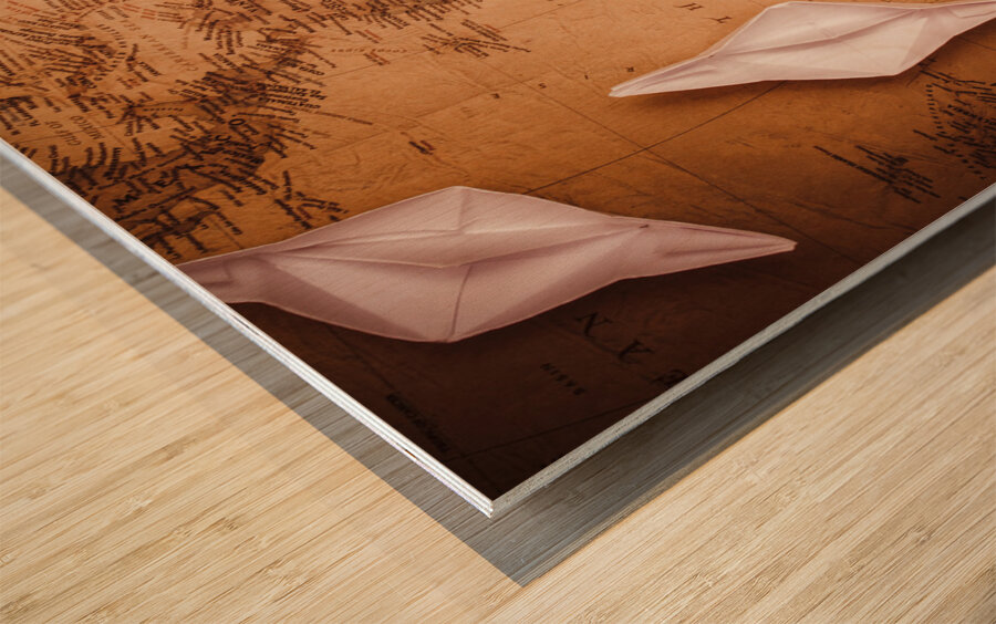 Explorer desk with compass map and spyglass Wood print