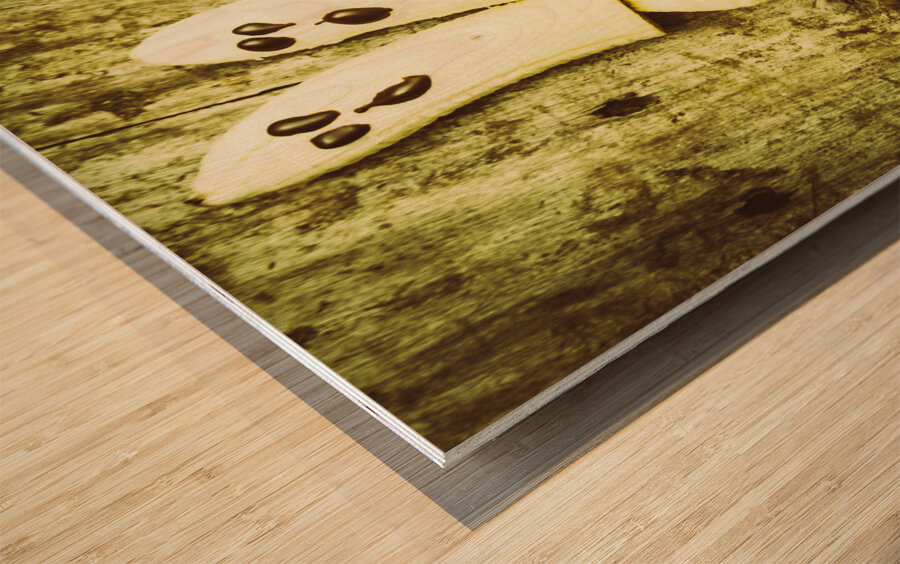 Bananas with painted chocolate faces Wood print