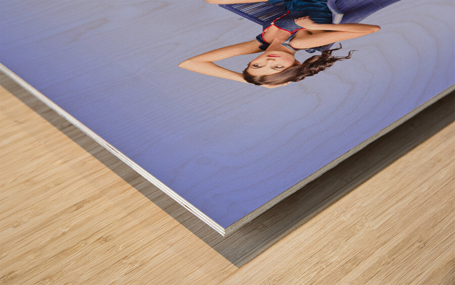 Full-length portrait. Lovely woman in denim dress Wood print