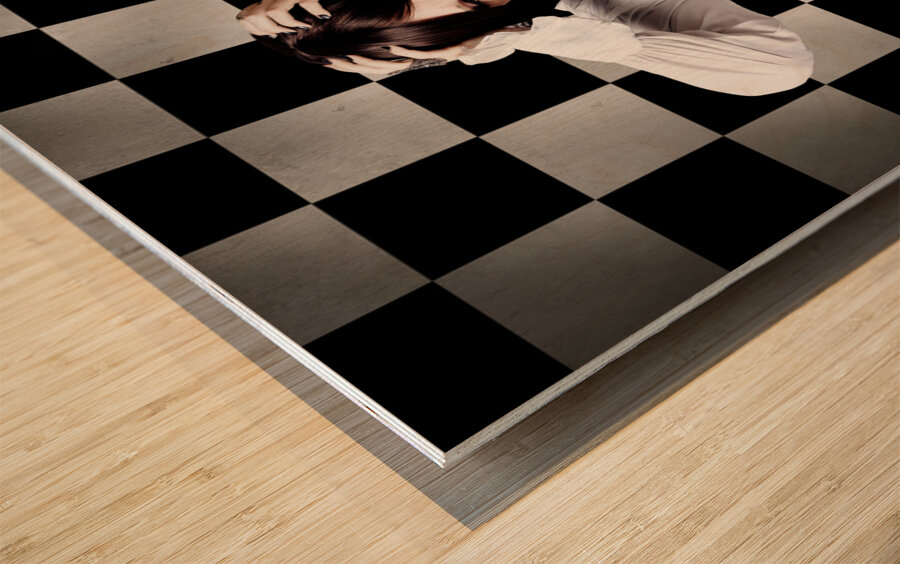 Retro girl crying over a glass of spilt milk Wood print