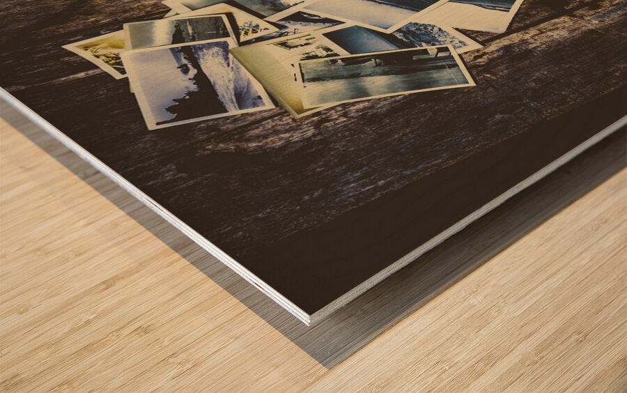 Heart-shaped instant photographs on wooden background Wood print