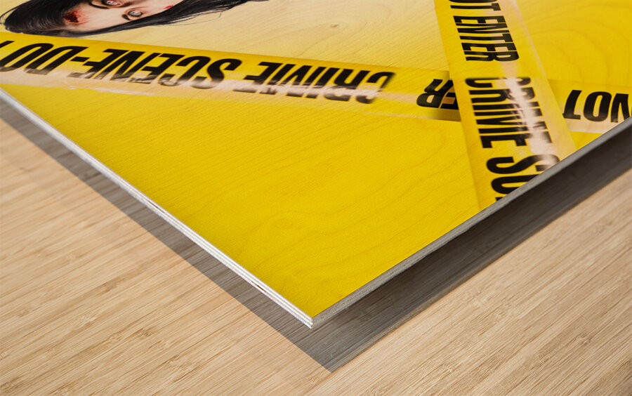 Dead zombie wrapped in tape at crime scene Wood print