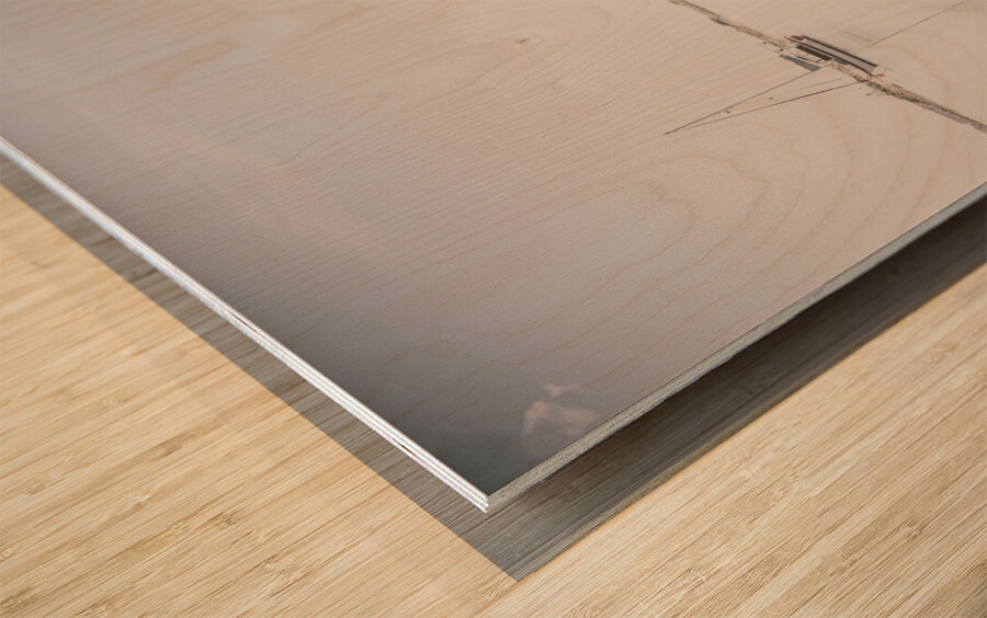 Vintage photo of a fishing boat anchored at dusk Wood print