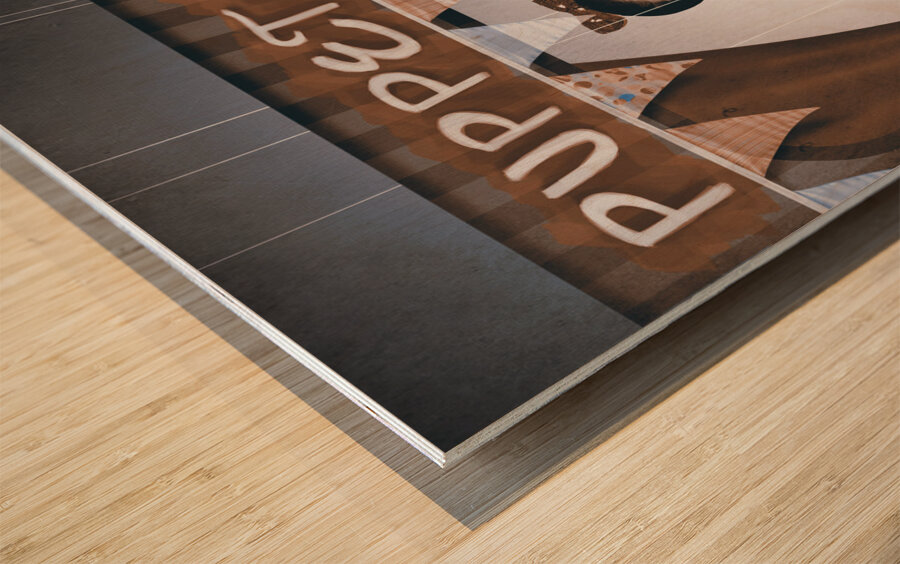 Vintage pinup girl inside a puppet show booth Wood print