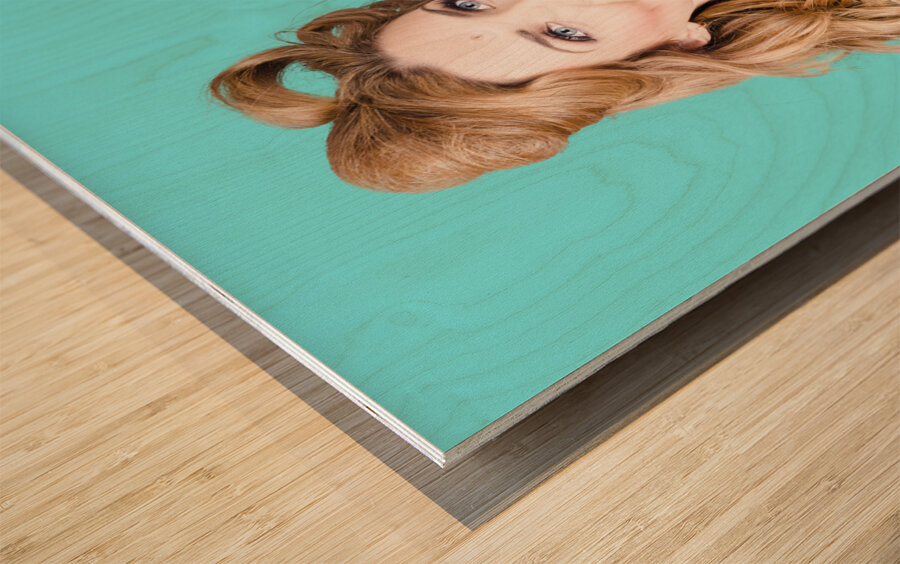 Blonde girl holding windmill fan. Natural energy Wood print