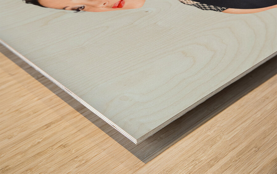 Woman posing with hat Wood print