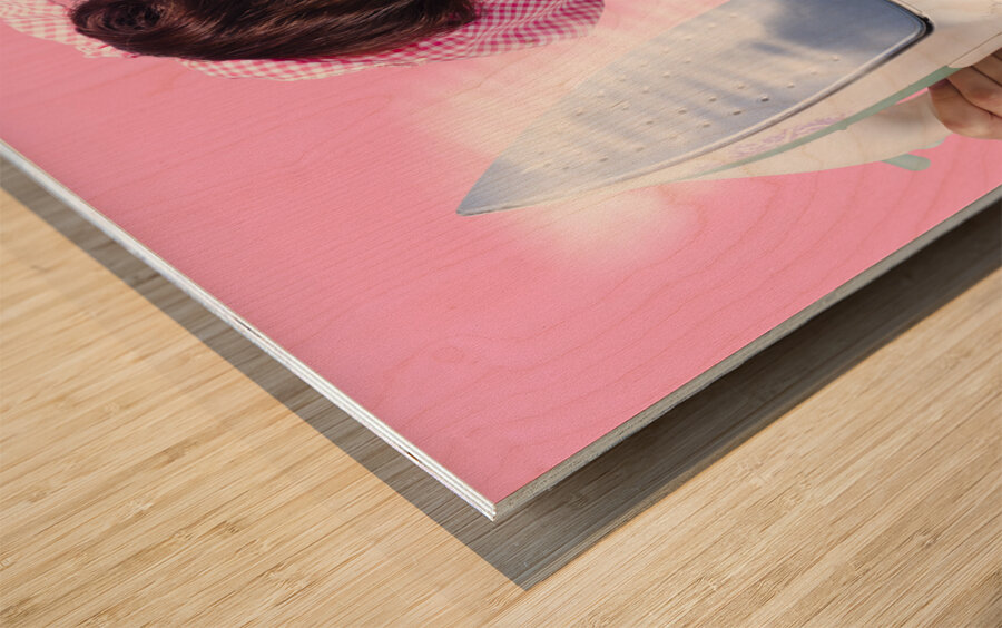 Smiling housewife doing housework laundry duties Wood print